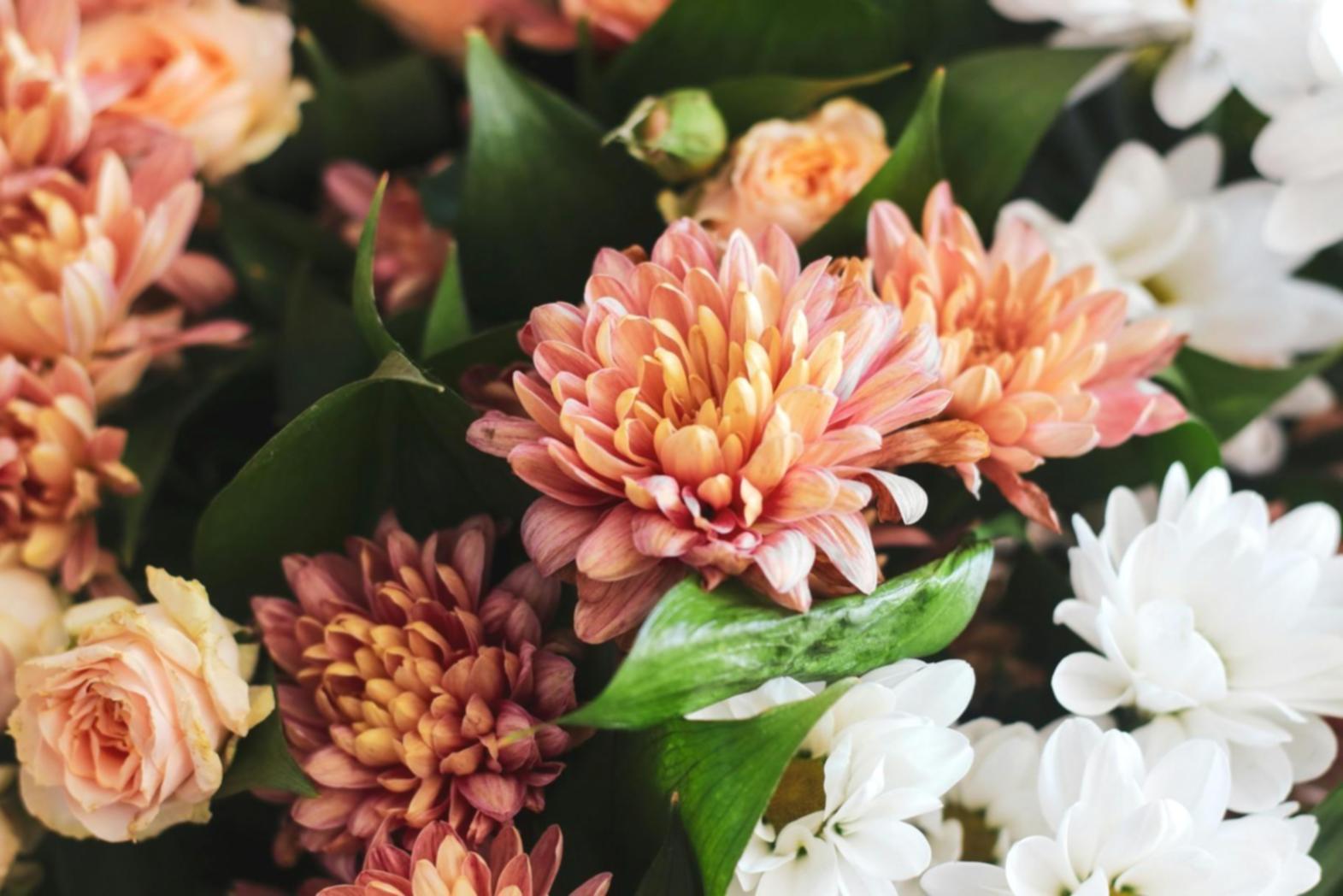 Custom seasonal floral arrangement designed for specific interior space